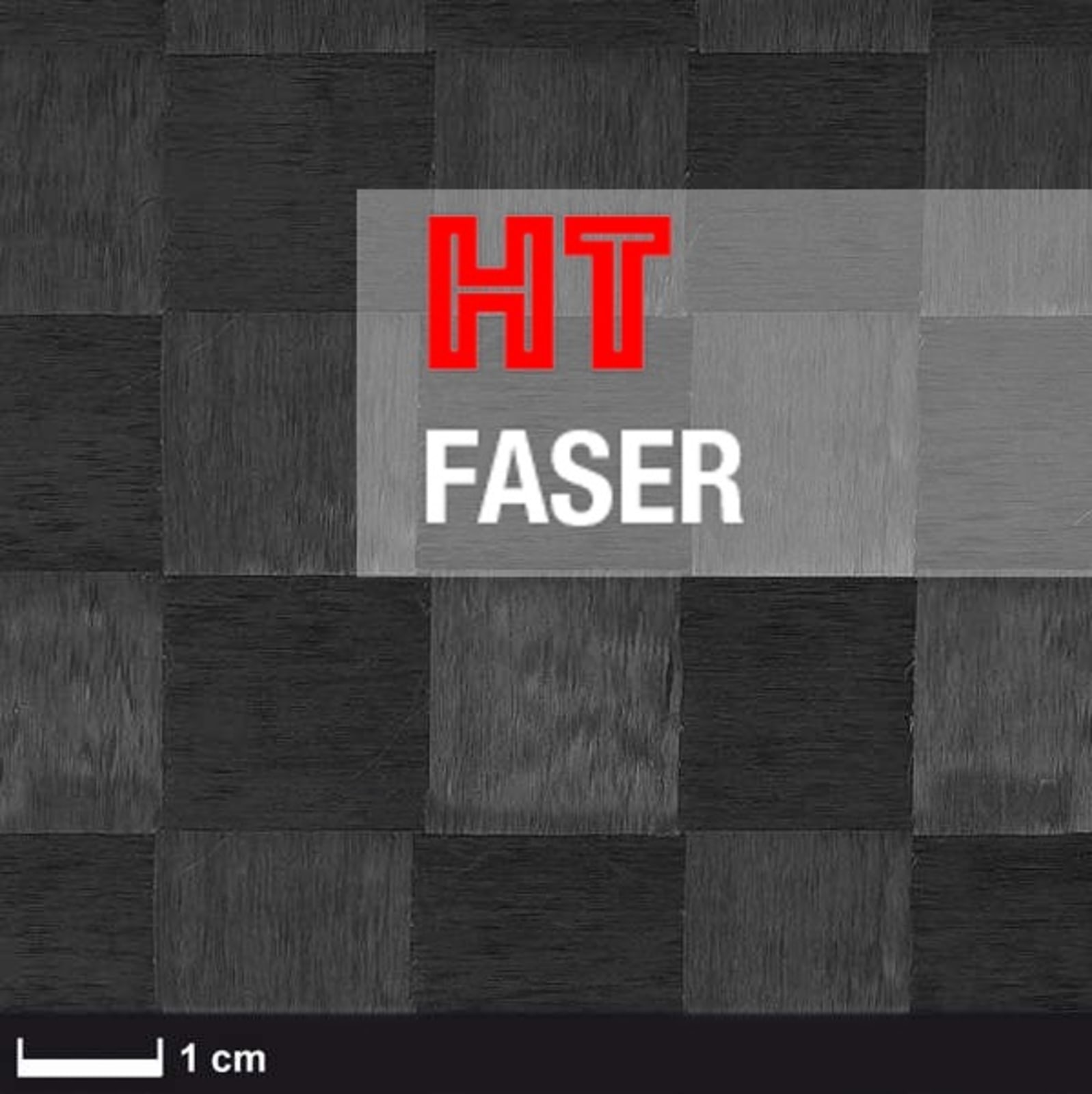 The image shows a black and gray checkered pattern with the words 'HT FASER' written in red and white. A scale indicating 1 cm is visible.