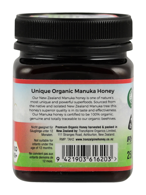 Produktfoto: Ein Glas Bio-Manuka-Honig der Marke TranzAlpine ist abgebildet. Das Etikett zeigt ein Bergmotiv und die Aufschrift 'Bio-Organic Manuka Honey MGO 400+ aus Neuseeland'. Der Honig ist in einem dunklen Glas mit schwarzem Deckel verpackt.