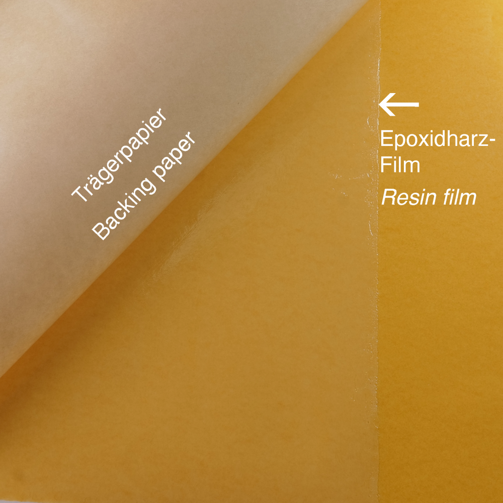 Ein Bild zeigt zwei Materialien: Trägerpapier und Epoxidharz-Film, beschriftet in Deutsch und Englisch.