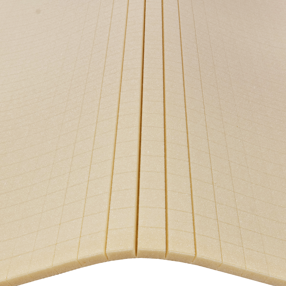The image shows beige foam sheets with grooves, likely for cushioning or insulation. The sheets are arranged in a layered manner.