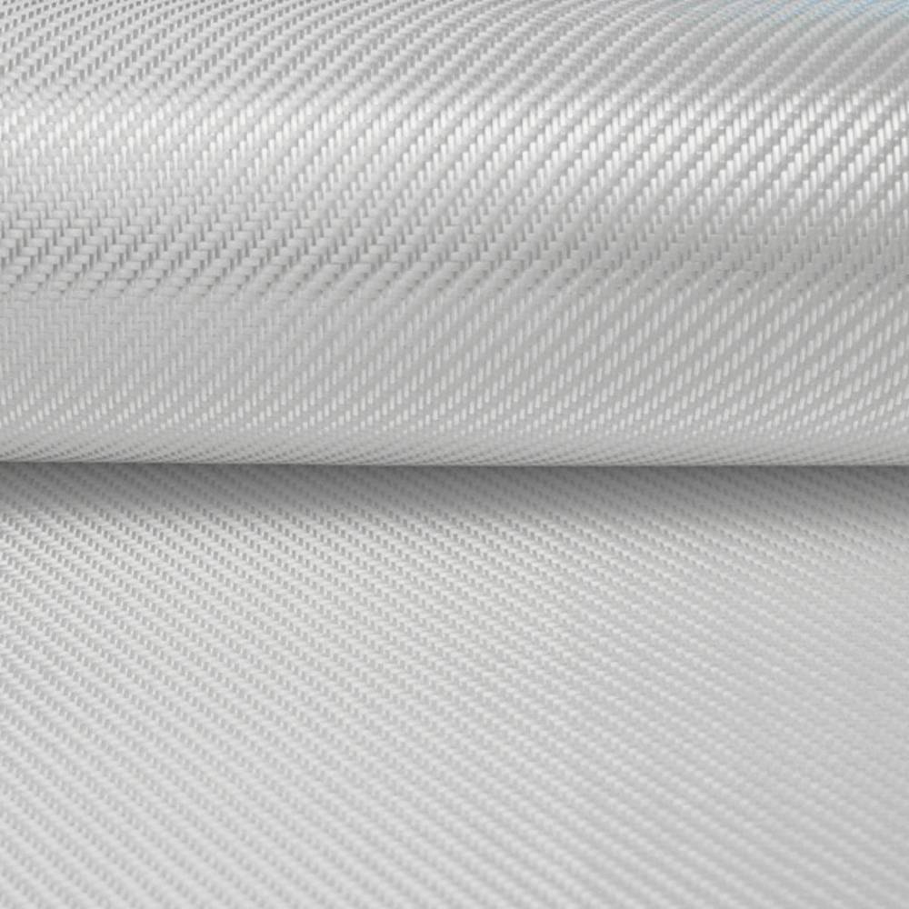 A close-up view of a roll of white woven fabric with a textured pattern.