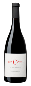 Produktfoto: Weinflasche mit Etikett “Des Clous“, “Pic Saint-Loup“, “Domaine Clavel“.