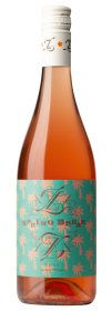 Produktfoto: Roséweinflasche mit türkisfarbenem Etikett und Palmenmotiv.