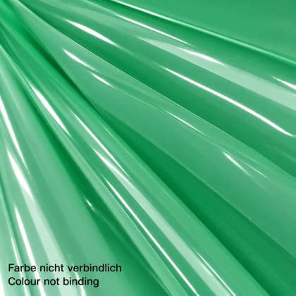 Nahaufnahme von grünen, glänzenden Oberflächen, die parallel verlaufen.