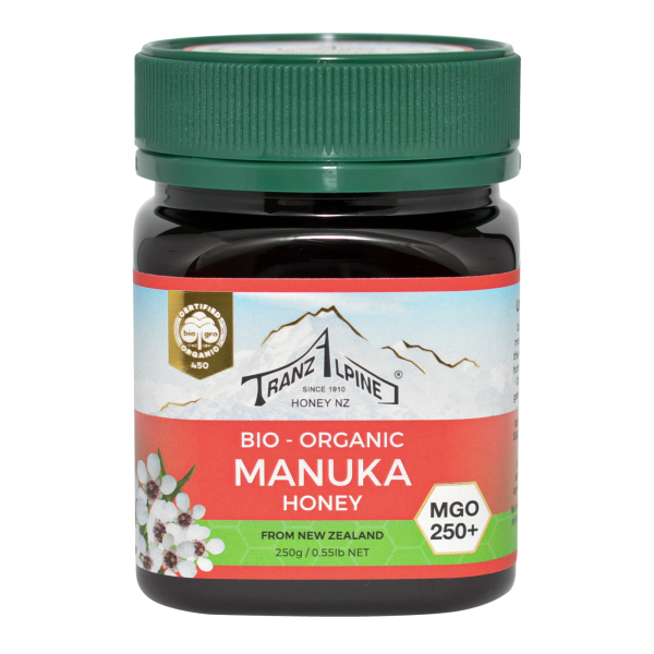 Produktfoto: Ein Glas Bio-Manuka-Honig der Marke TranzAlpine mit grünem Deckel, 250g, MGO 250+, aus Neuseeland.