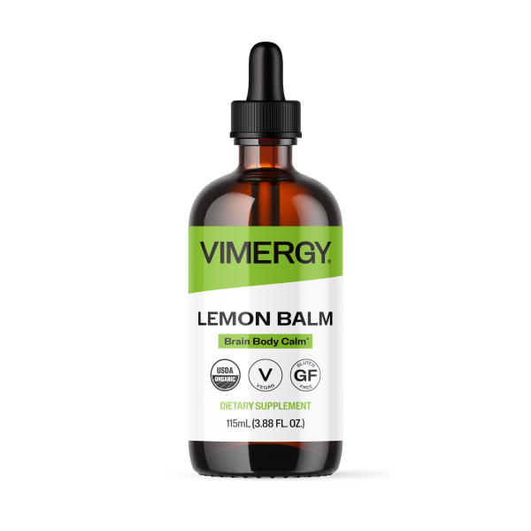 Produktfoto: Eine braune Glasflasche mit einem grünen Etikett, auf dem 'Lemon Balm Dietary Supplement' steht. Daneben liegt eine Pipette mit schwarzem Gummiball.