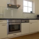 Blick in die Küche der Wohnung 17 in der Residenz Leuchtturm